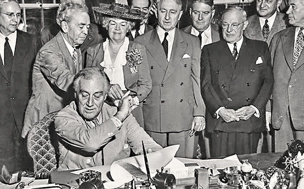 President Roosevelt signing the G.I. Bill